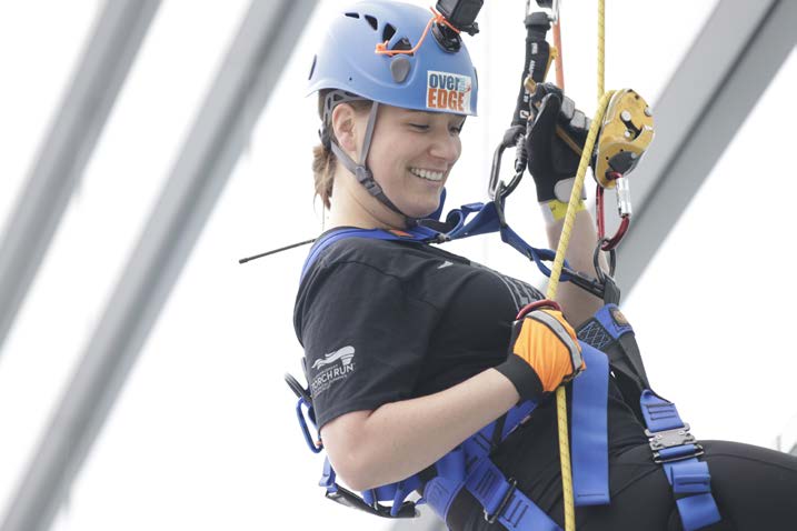 Participant on a ropes course