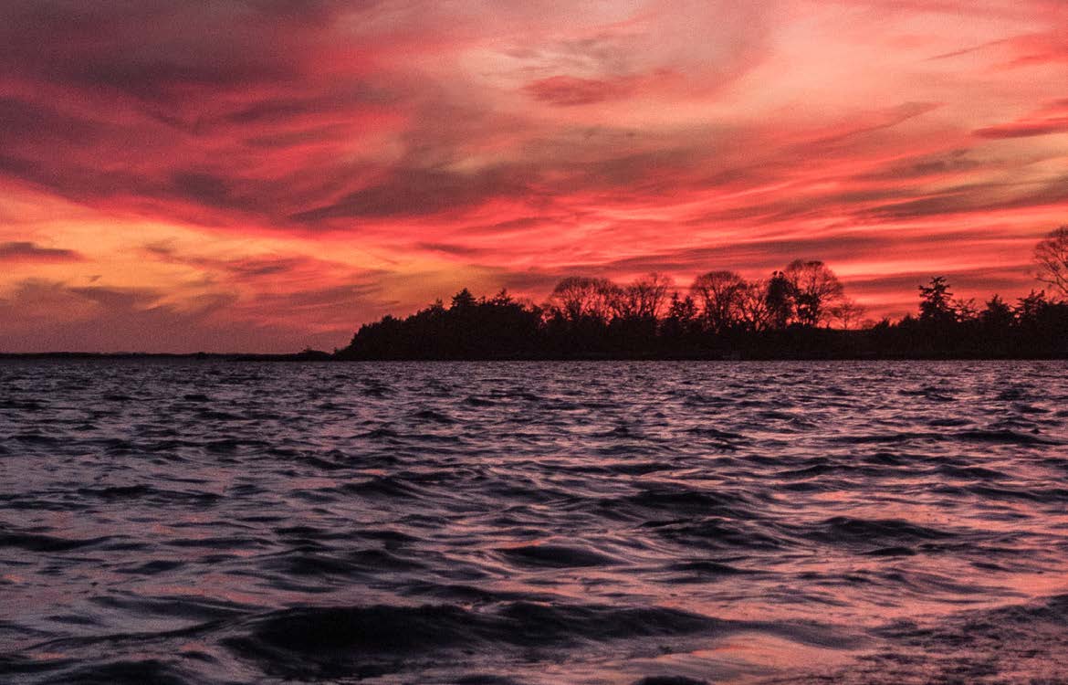 Red sunset over water
